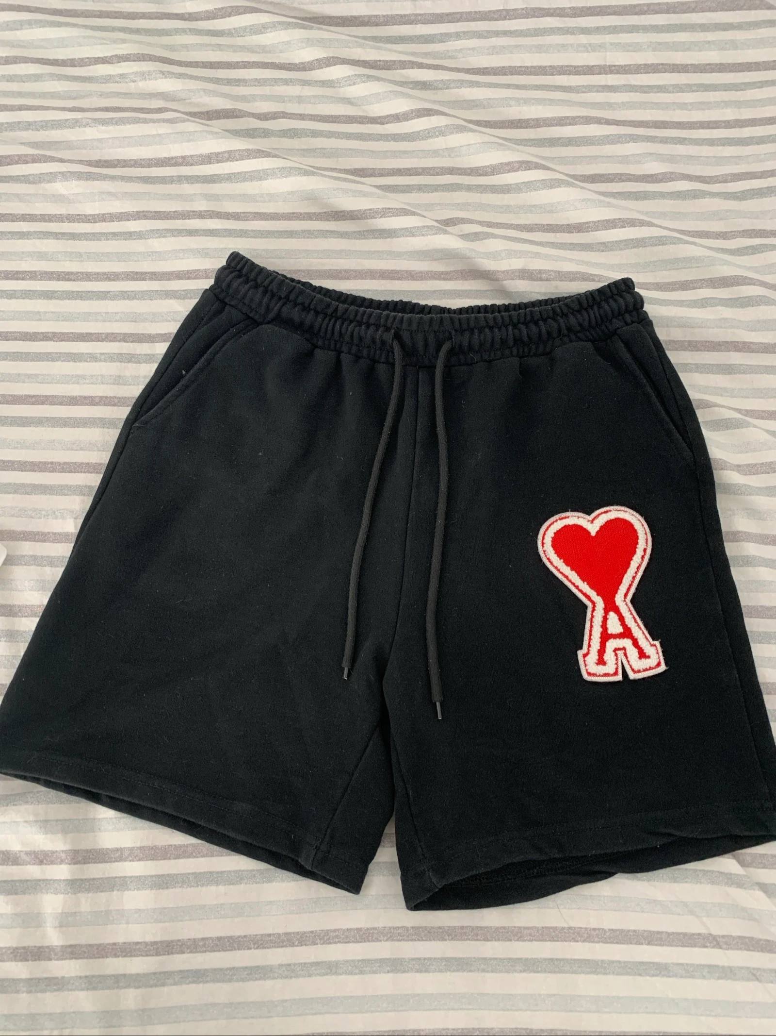 Pantalon corto Ami paris 
